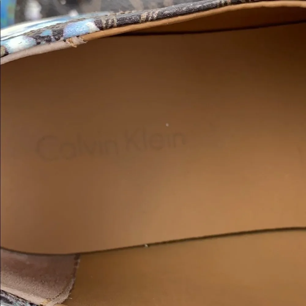 Calvin Klein Imilia floral monogram sneakers.